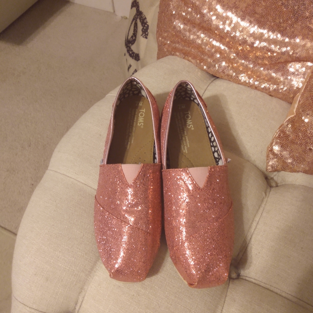 Glittery baby pink TOMS flats